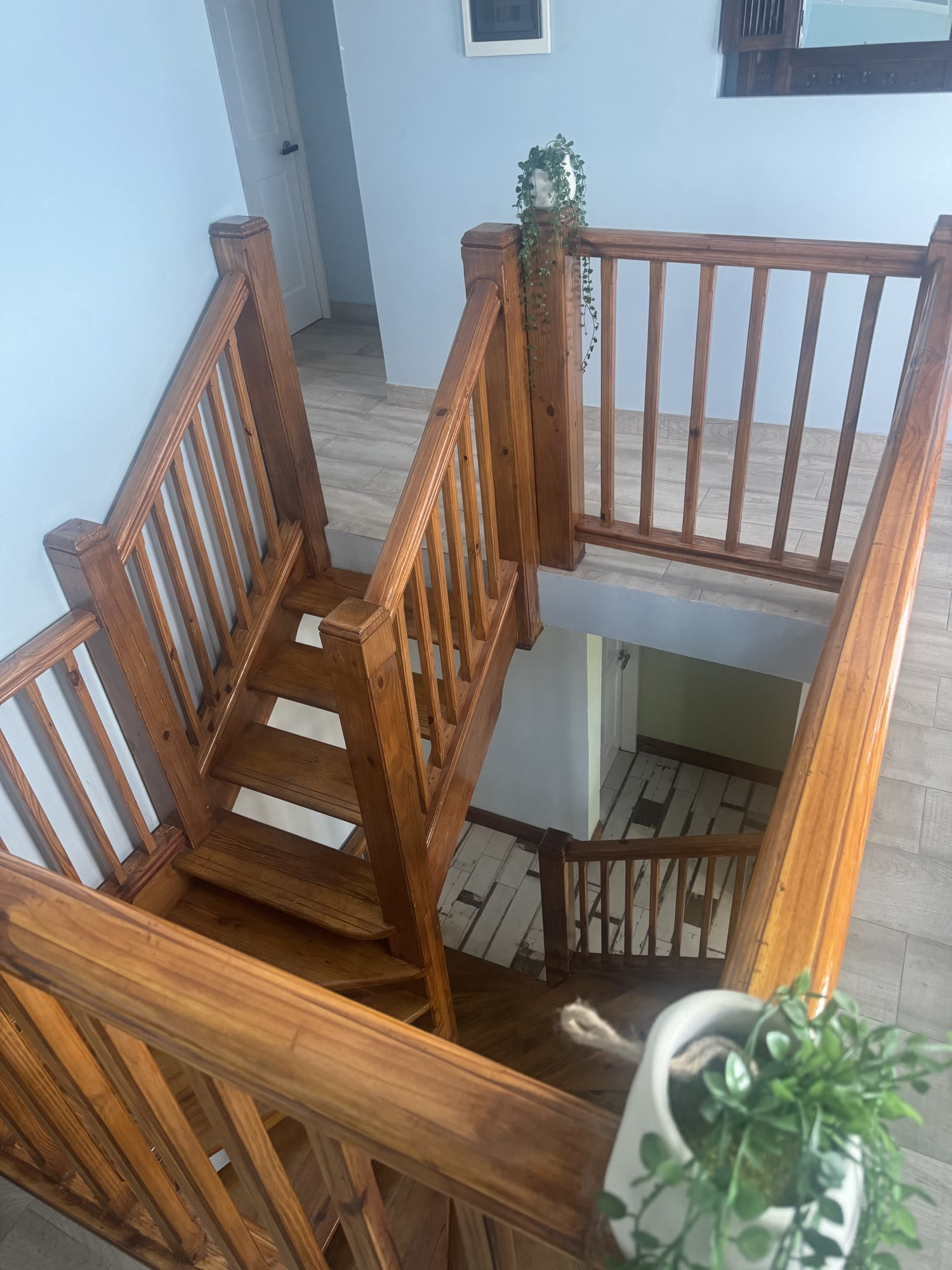 Hand-finished timber joinery on the BethsAida staircase and upper-floor landing